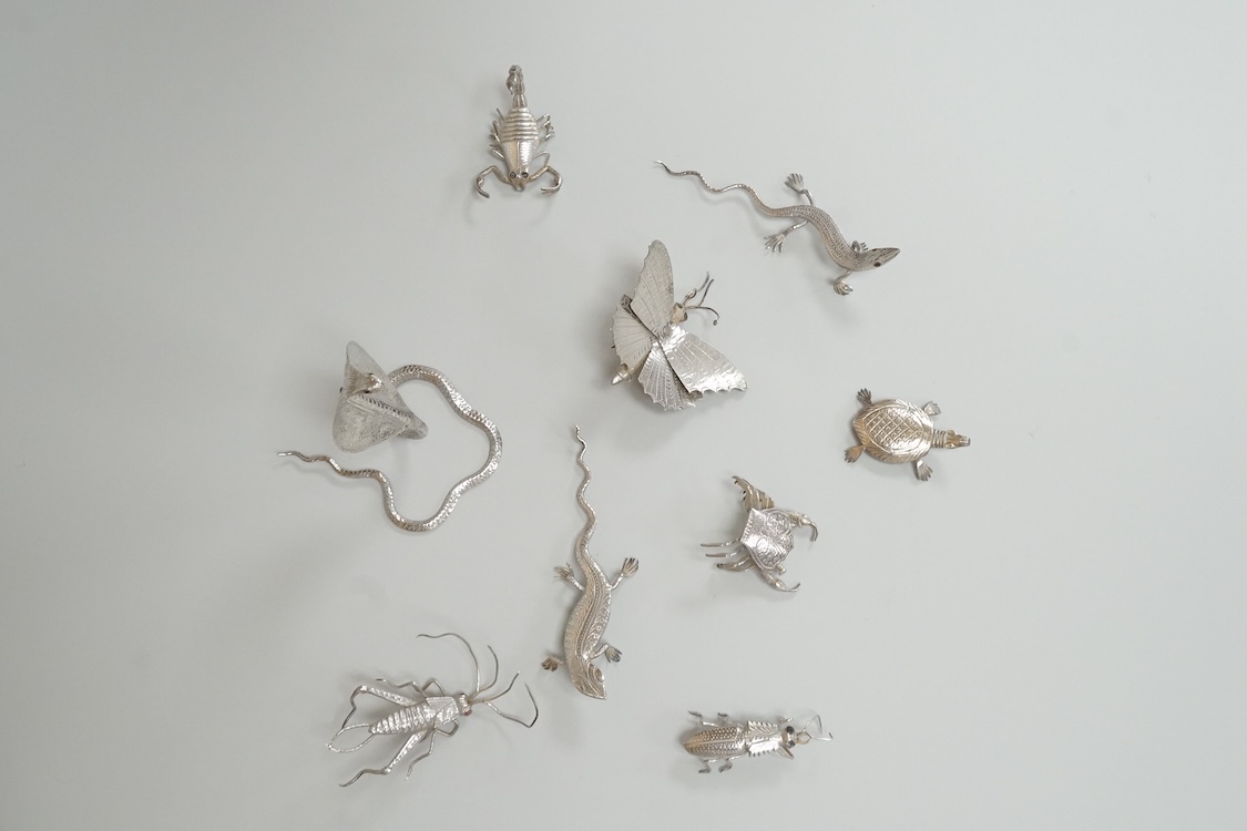 A group of nine assorted Indian white metal miniature model insects and reptiles, etc. including a King Cobra, scorpion, lizards, turtle, butterfly and crab etc.